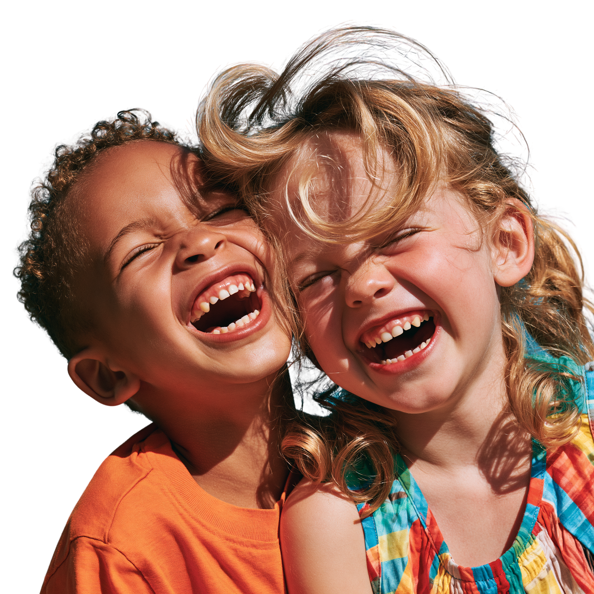 Two children laughing together